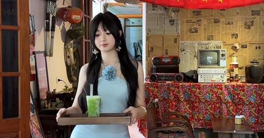 Nữ nhân viên quán nước gây sốt vì mặc đồ lộng lẫy khi làm việc